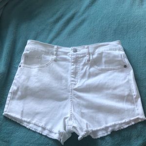 White jean four pocket jean shorts.